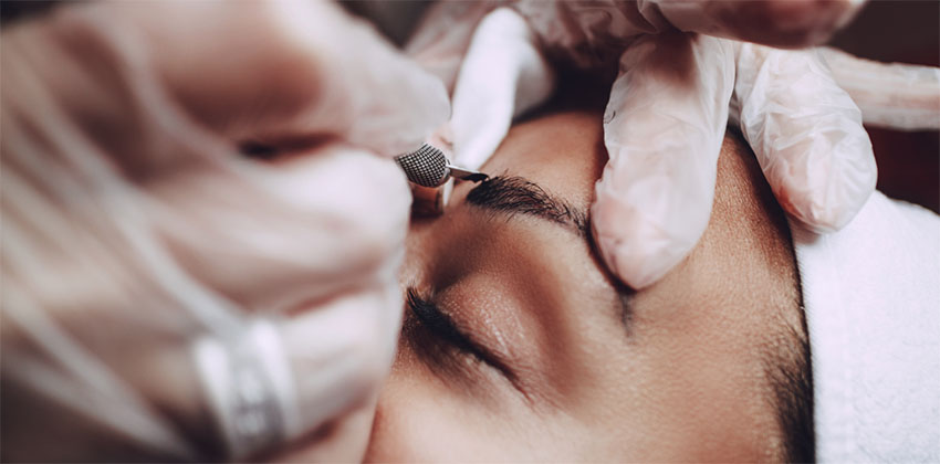 woman getting microbladed